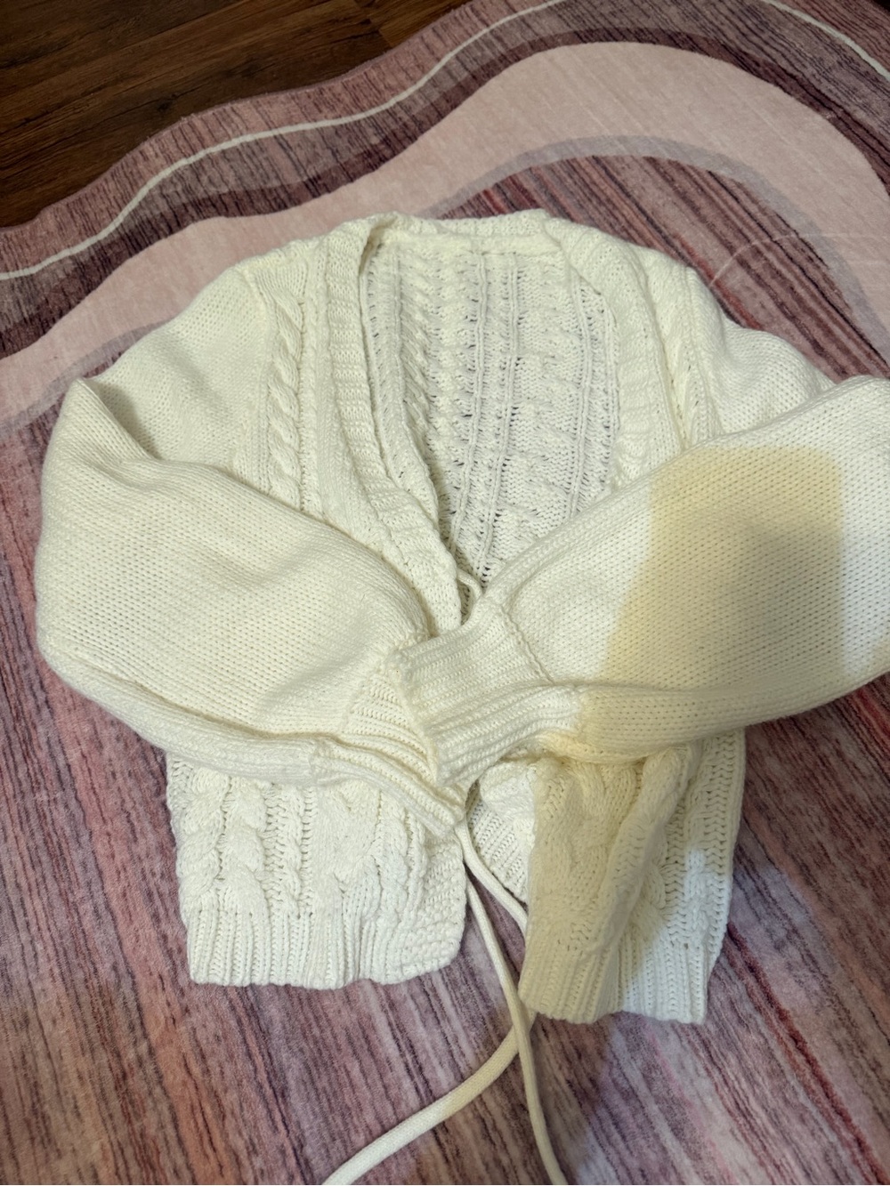Women’s cream cable knit sweater